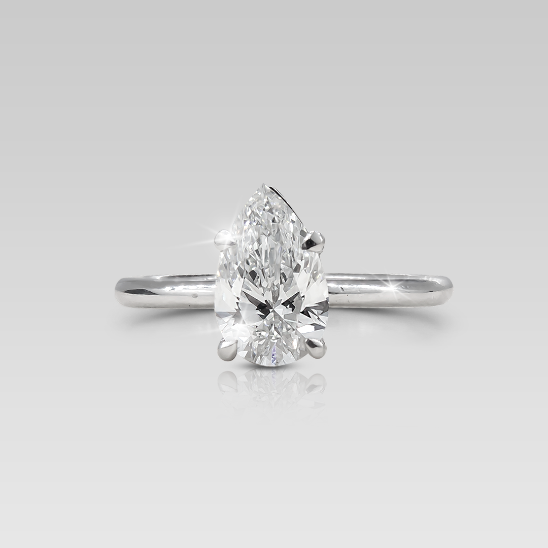 Anillo de Compromiso Solitario Adamant • Pear